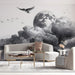 Minimalist bedroom wall featuring monochrome etched clouds and moonlight art