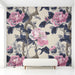 Floral mural wallpaper in a bright, airy entryway with neutral bedding