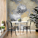 Artistic charcoal and ochre floral mural wallpaper in a contemporary home office
