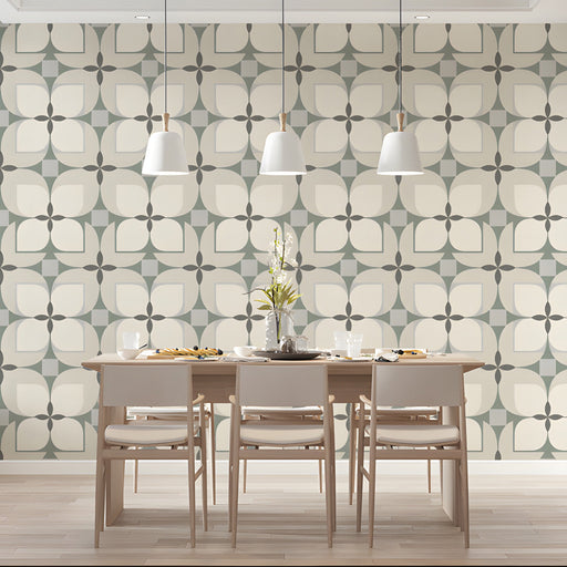 A modern home office with a light and organized geometric wallpaper backdrop