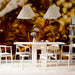 Dramatic dining room interior with rich brown and gold painterly mural wallpaper