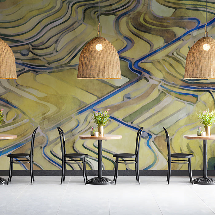 Bar with a serene abstract landscape mural providing a backdrop for a minimalist wooden table.