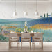 A bright, cheerful dining space with the landscape wallpaper, enhancing creativity and calm.