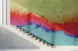 Bright entryway featuring an abstract wave mural as a vibrant accent wall