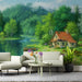 Impressionist forest and lake mural featured in a home office reading nook.