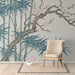 Bamboo and plum blossom wallpaper installed in a peaceful entryway with light wood furniture