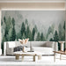 An elegant entryway hallway decorated with a vertical pine forest mural in soft green and silver tones.