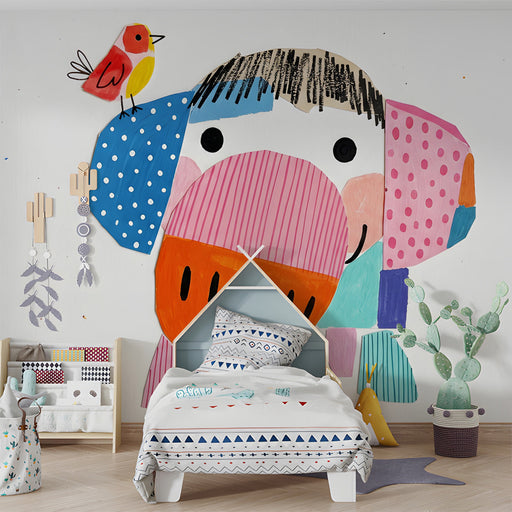 Whimsical elephant wallpaper installed in a bright modern nursery with light wood furniture