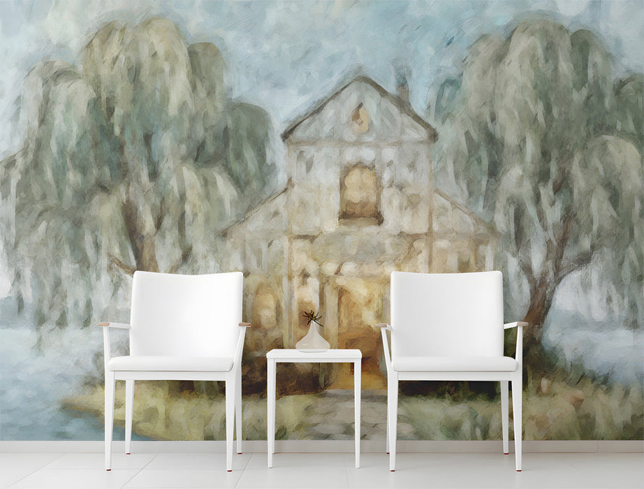 A cozy reading nook featuring the lakeside chapel mural wallpaper, styled with a plush armchair and warm ambient lighting.