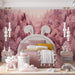 A bedroom with a soft pink woodland mural behind a bed with neutral linens.