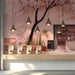 A serene shop space decorated with a delicate painterly cherry blossom wallpaper mural.