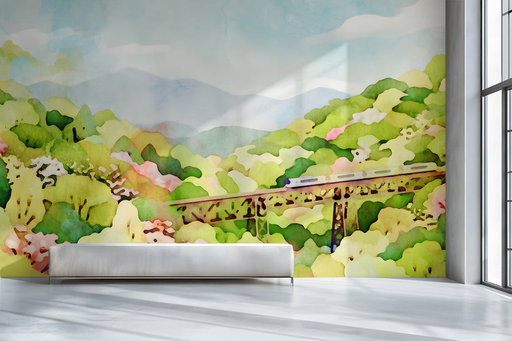 Scenic entryway wall featuring a soft watercolor landscape with a train and rolling hills