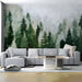 A cozy living room featuring a misty green forest mural behind the headboard for a tranquil feel