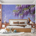 Whimsical bedroom wall featuring a painterly wisteria and fox mural behind a cream upholstered headboard