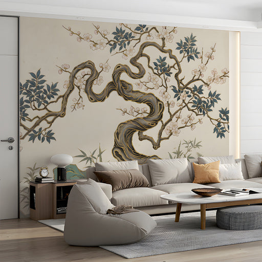 The bonsai mural installed behind a minimalist living room sofa in soft beige tones.