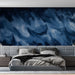 Moody master bedroom interior featuring an abstract blue wave mural wall