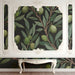Inviting reading nook with olive branch wall covering and warm ambient lighting