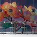 Primary bar featuring a stained glass style floral wall mural behind a bed with neutral bedding