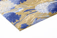 Blue and gold wave floral mural in a serene master bedroom