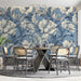 Elegant Baroque-inspired floral wall mural in a luxury bedroom featuring soft cream bedding.