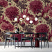 Rich floral botanical wall design applied in a dining room with dark wooden shelving