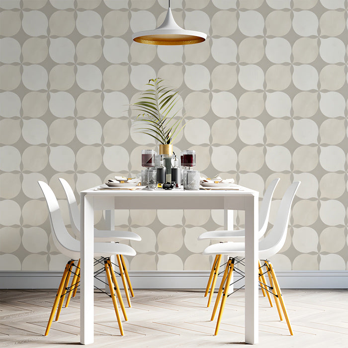 Bright minimalist dining room decorated with a subtle petal geometric wallpaper