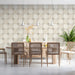 Modern dining room wall with a repeating petal pattern in warm neutral tones