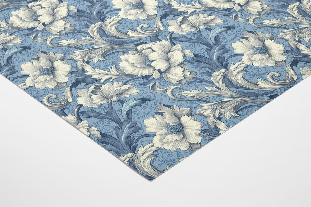 A cozy bedroom interior featuring traditional blue and white floral mural wallpaper.