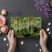 Green woodland nature wallpaper in a cozy home office setup