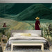 bedroom featuring a large landscape wallpaper mural on the main wall with minimalist furniture