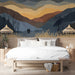 Modern bedroom featuring a mountain landscape mural on the accent wall behind the bed