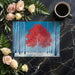 Minimalist bedroom interior with a striking red tree forest mural above the bed headboard