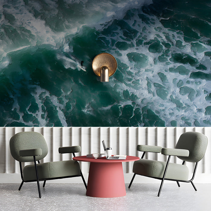 Moody coastal mural behind a minimalist reception in a calm entryway