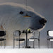 Cafe area featuring arctic animal wall mural with soft lighting