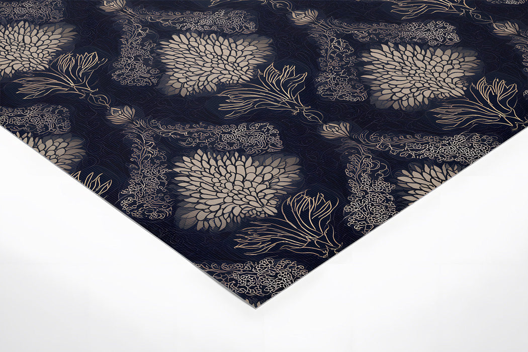 Moody primary bedroom with elegant damask wallpaper behind a tufted headboard