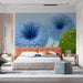Blue floral mural installed on a feature wall in a tranquil minimalist bedroom