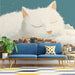 A bright creative playroom for kids, showcasing the surreal sleeping feline mural as a colorful accent wall.