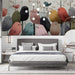 Artistic bird flock mural used as a creative accent wall in a bedroom.
