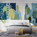 Modern bedroom featuring a colorful city sketch mural on the main feature wall