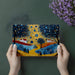 Whimsical bedroom wall decor featuring a starry meadow scene in a painterly style
