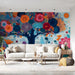 A bright, imaginative living room featuring the colorful floral garden mural as an accent wall.