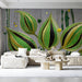 Modern living room featuring an abstract leaf mural as a dramatic accent wall.