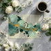 Sophisticated home office with artistic emerald and gold ink wash wallpaper