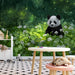 Enchanted forest nature mural in a calming playroom with a velvet armchair and floor lamp
