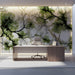 Bright office interior with an artistic tree branch wall mural providing a natural focal point