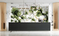 Close up of modern reception featuring a gilded tree branch mural with gold accents