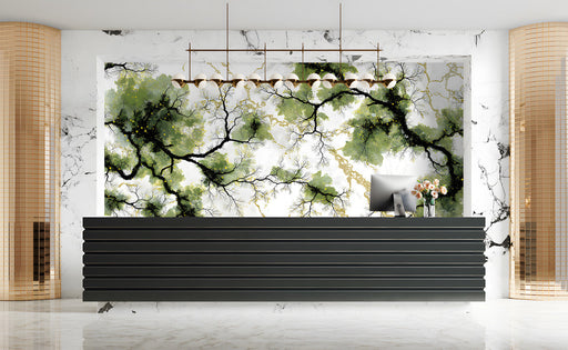 Close up of modern reception featuring a gilded tree branch mural with gold accents
