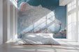 Modern bedroom wall decorated with a whimsical mural featuring a cat overlooking a village