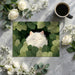 Playful cat forest mural installed in a cozy bedroom with green bedding and ambient warm lighting.