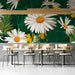 Close up of daisy floral wall mural installed in a cozy meeting room with warm accent lighting
